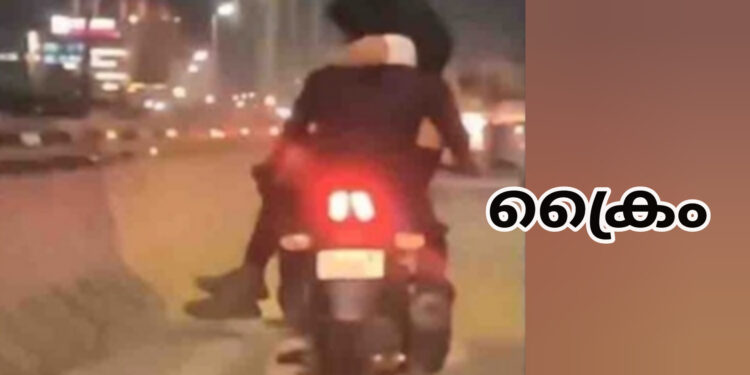 ഓടി കൊണ്ടിരിക്കുന്ന ബൈക്കില്‍ കാമിതാക്കളുടെ പ്രണയലീലകളി: യുവാവിനെ പോലീസ് അറസ്റ്റ് ചെയ്തു
